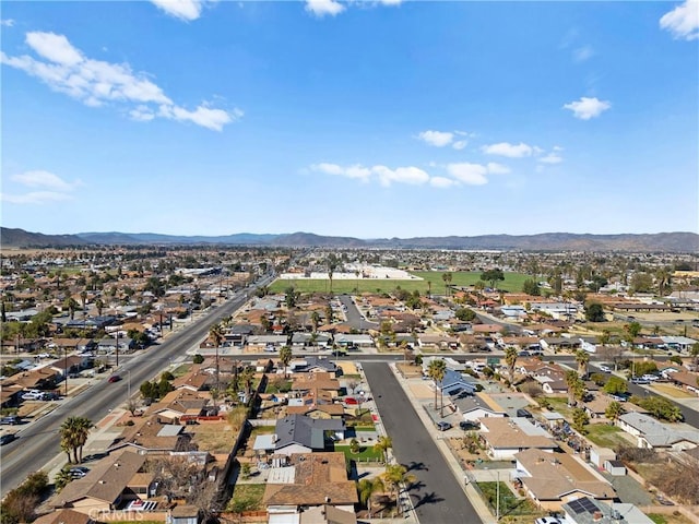 bird's eye view with a residential view and a mountain view