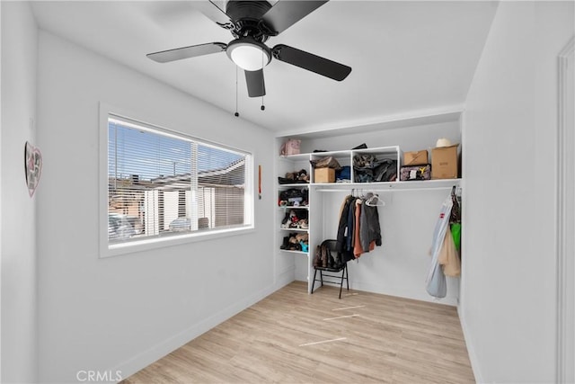 mudroom featuring ceiling fan, baseboards, and wood finished floors