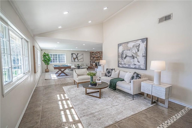 tiled living area with recessed lighting, baseboards, visible vents, and ornamental molding