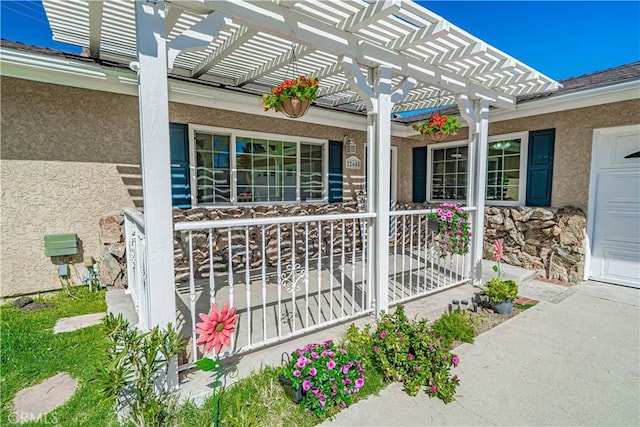 exterior space featuring a garage and a porch