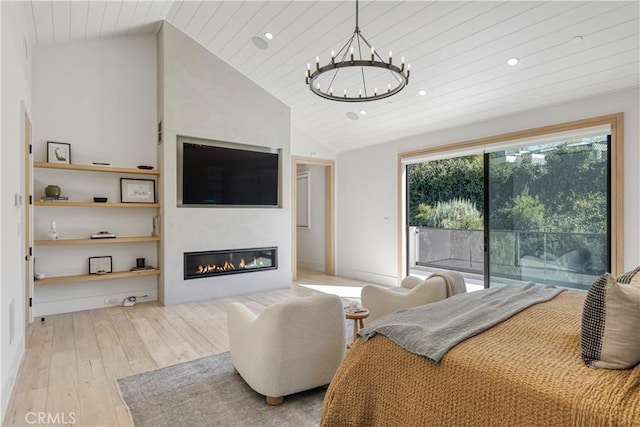 4050 Contera Rd, Encino, CA 91436 - bedroom with access to outside, wood-type flooring, vaulted ceiling, a chandelier, and recessed lighting