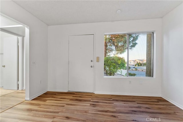 4738 Knoll Wood Ct, Oceanside, CA 92056 - entrance foyer featuring wood finished floors and baseboards