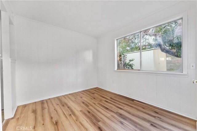 4738 Knoll Wood Ct, Oceanside, CA 92056 - unfurnished room featuring wood finished floors, crown molding, and baseboards