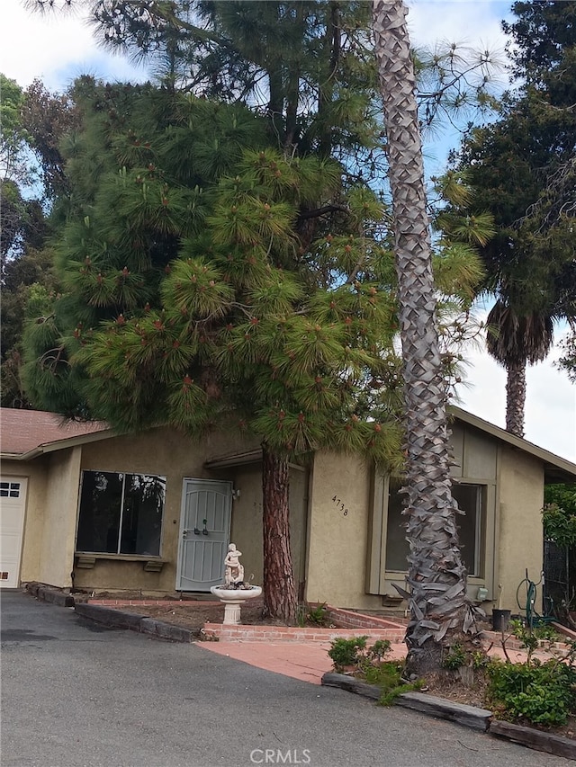 4738 Knoll Wood Ct, Oceanside, CA 92056 - view of front of home featuring stucco siding