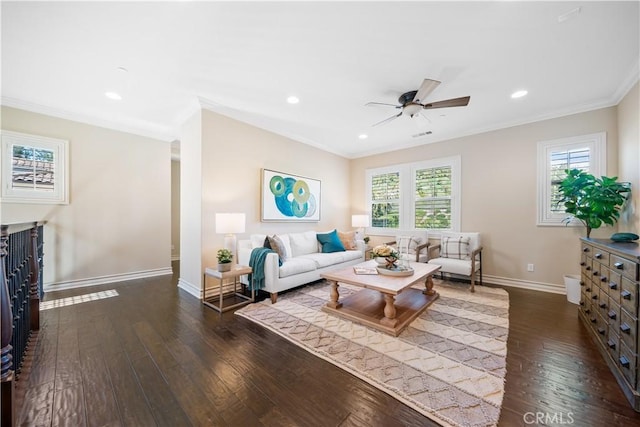 living area featuring baseboards, recessed lighting, dark wood finished floors, and crown molding