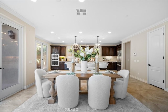 dining room featuring recessed lighting, visible vents, baseboards, ornamental molding, and an inviting chandelier