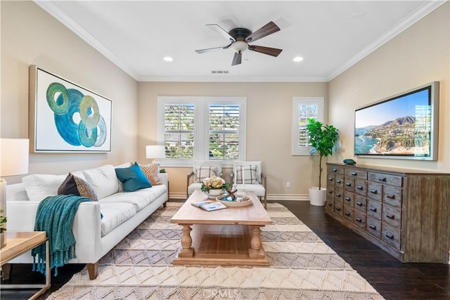 living area with ornamental molding, visible vents, baseboards, and dark wood-style floors