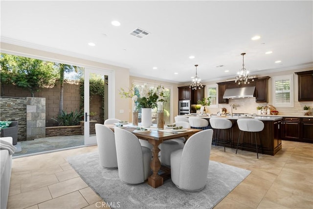 dining room featuring ornamental molding, light tile patterned flooring, visible vents, and recessed lighting