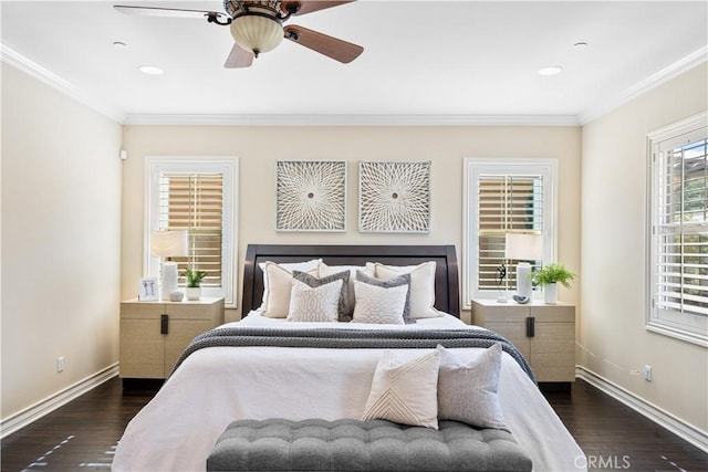 bedroom featuring ornamental molding, baseboards, and wood finished floors