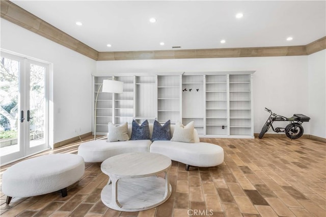 living area featuring visible vents, baseboards, french doors, and recessed lighting