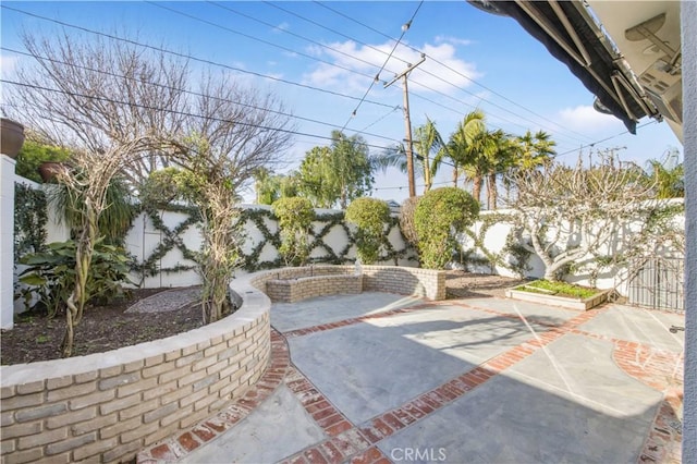 exterior space featuring a patio area and a fenced backyard