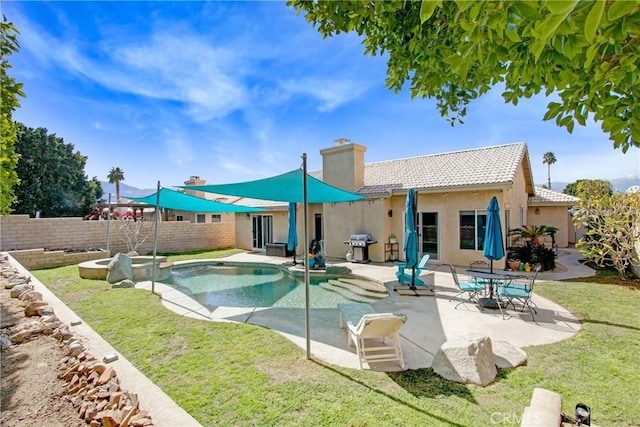 view of swimming pool featuring a fenced in pool, fence private yard, a grill, a yard, and a patio area