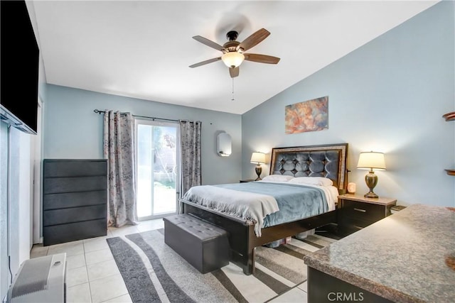 bedroom featuring access to exterior, a ceiling fan, vaulted ceiling, and light tile patterned floors