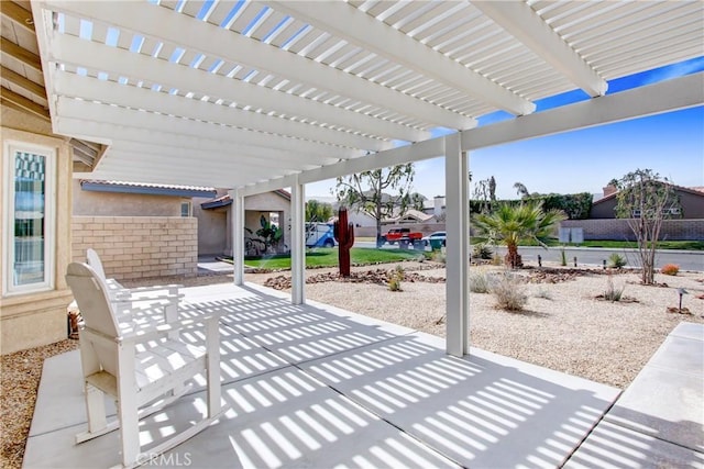 view of patio featuring a pergola