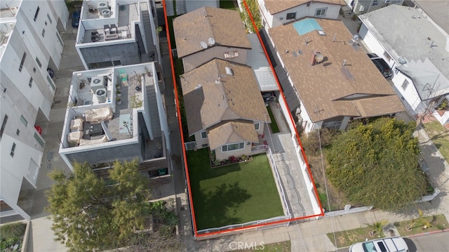 birds eye view of property with a residential view