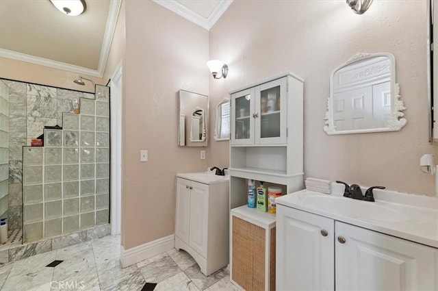 bathroom with a walk in shower, two vanities, a sink, marble finish floor, and crown molding