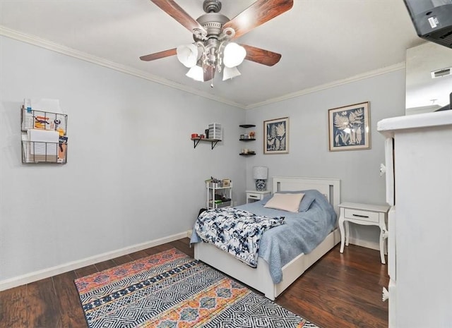 bedroom featuring ornamental molding, wood finished floors, a ceiling fan, and baseboards