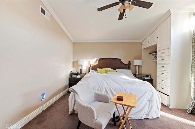 carpeted bedroom with ornamental molding, visible vents, ceiling fan, and baseboards