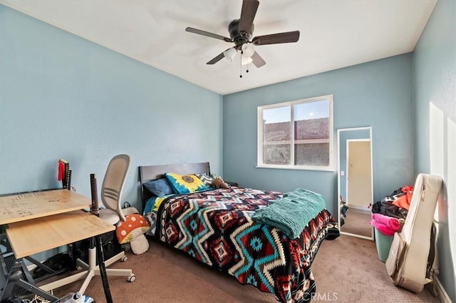 bedroom featuring carpet and a ceiling fan