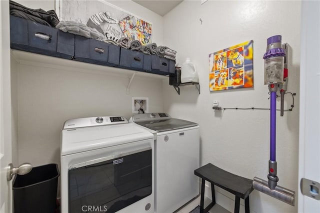 laundry room with laundry area and washing machine and dryer