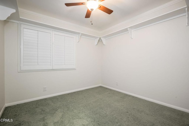 walk in closet with carpet and ceiling fan