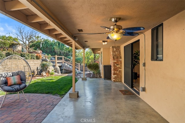 view of patio / terrace featuring visible vents, a fenced backyard, and a ceiling fan