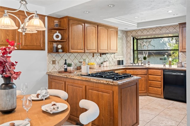 kitchen with a tray ceiling, gas stovetop, open shelves, a sink, and dishwasher