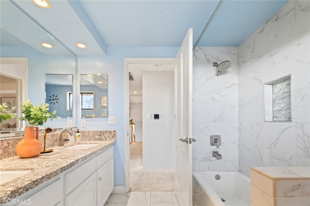 bathroom with marble finish floor, double vanity, shower / bathtub combination, recessed lighting, and a sink