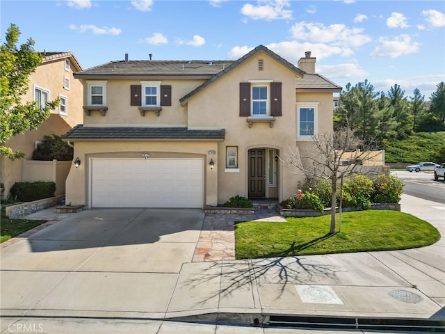 traditional-style house with concrete driveway, a tiled roof, and stucco siding