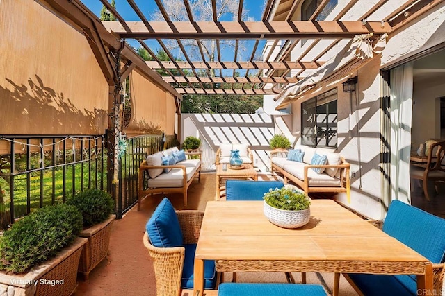 balcony featuring an outdoor living space, a pergola, and outdoor dining space