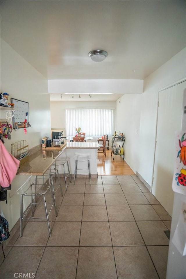 interior space with tile patterned flooring