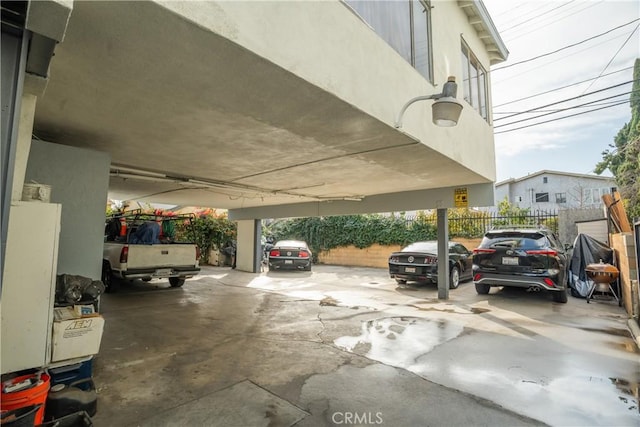 garage featuring fence