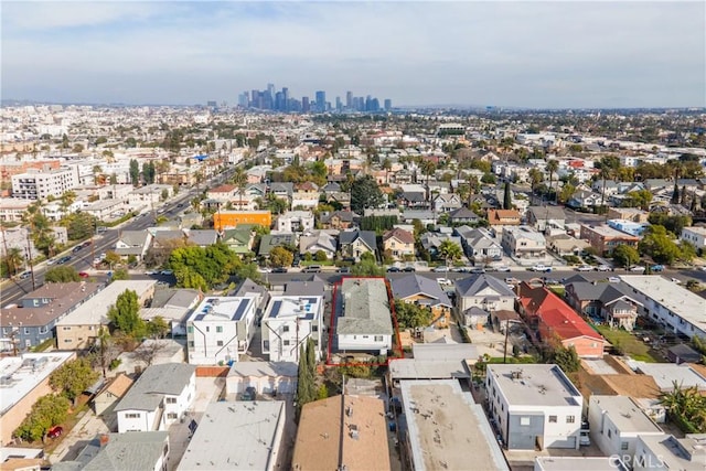 birds eye view of property featuring a city view