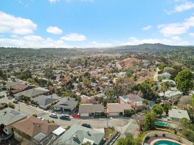 bird's eye view featuring a mountain view and a residential view