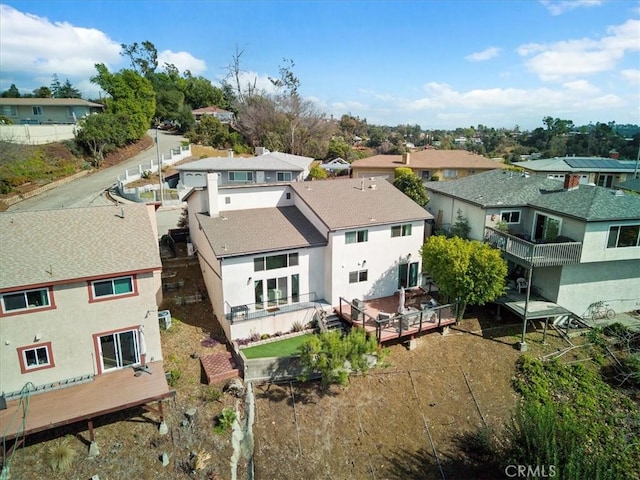 birds eye view of property with a residential view