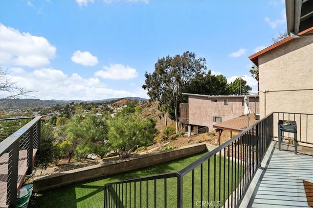 balcony featuring a mountain view