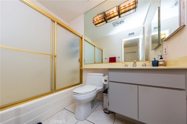 full bath with toilet, shower / bath combination with glass door, vanity, visible vents, and tile patterned floors