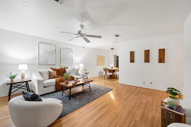 3839 Vista Campana S Unit 32, Oceanside, CA 92057 - living area featuring light wood-type flooring and a ceiling fan