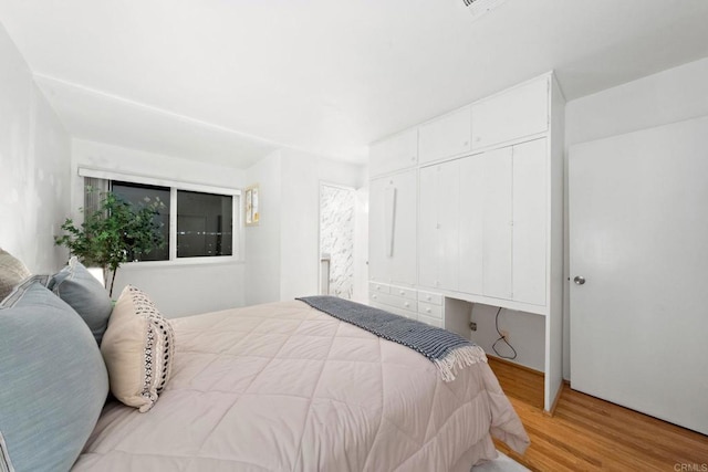 3839 Vista Campana S Unit 32, Oceanside, CA 92057 - bedroom with wood finished floors and a closet