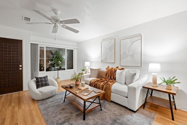 3839 Vista Campana S Unit 32, Oceanside, CA 92057 - living room with wood finished floors and a ceiling fan