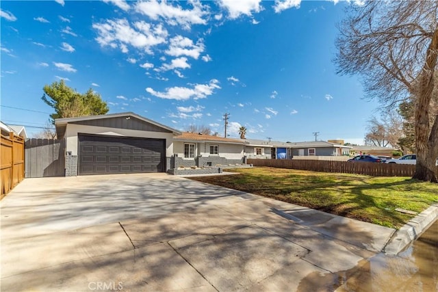 single story home with brick siding, fence, a garage, driveway, and a front lawn