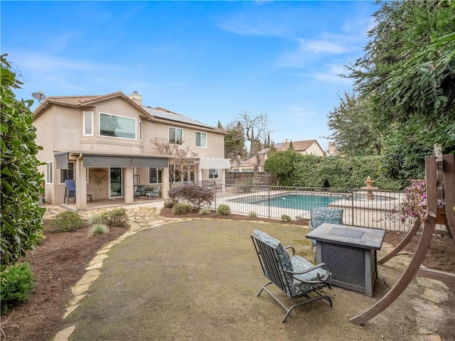 view of pool featuring a patio, fence, and a fenced in pool