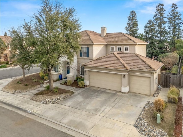 view of front facade featuring an attached garage, a tile roof, a chimney, and stucco siding