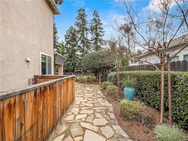 view of patio / terrace featuring fence