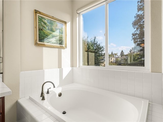 2705 E Ryan Ln, Fresno, CA 93720 - full bath with a garden tub, healthy amount of natural light, and vanity