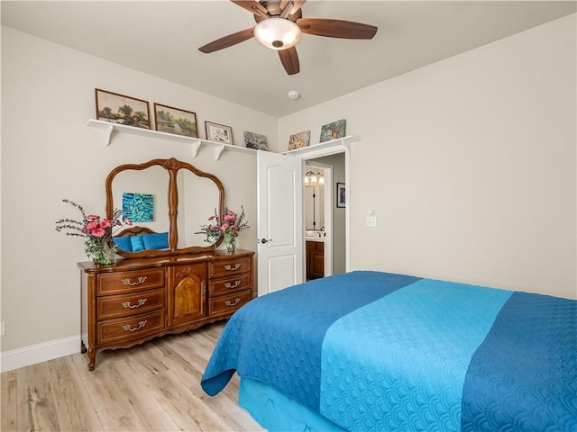 bedroom featuring light wood-style flooring, baseboards, and ceiling fan