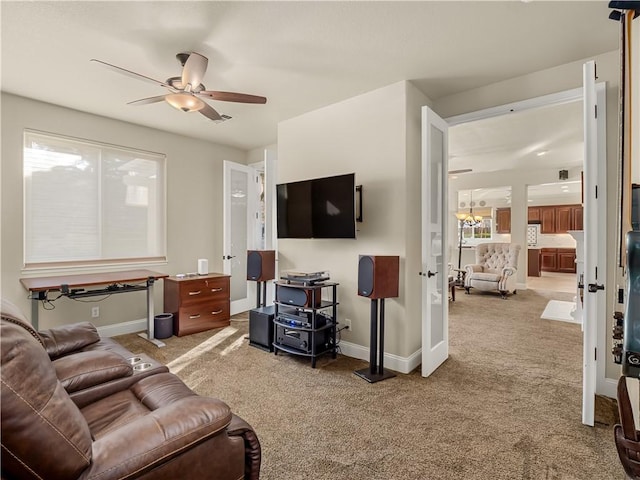 2705 E Ryan Ln, Fresno, CA 93720 - living room featuring carpet flooring, a ceiling fan, and baseboards