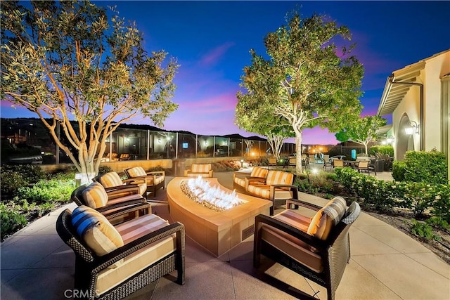 view of patio / terrace featuring a fire pit