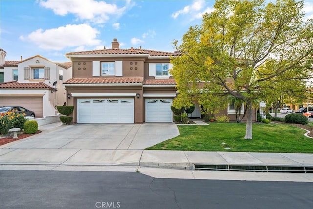 mediterranean / spanish-style home featuring concrete driveway, a chimney, a tiled roof, a front lawn, and stucco siding