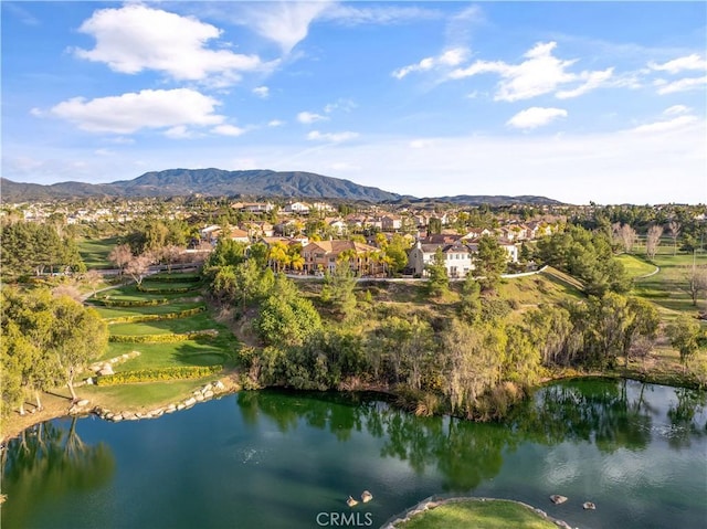 aerial view with a residential view and a water and mountain view